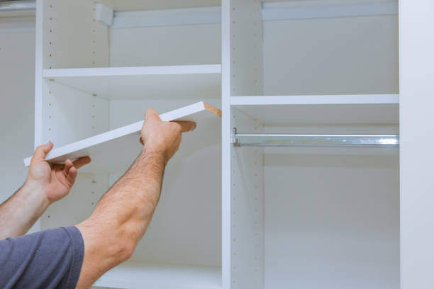 Assembling shelves for closet cabinet with home a new apartment