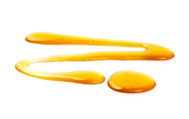 istock Honey drop isolated on white background, selective focus, isolated on white background 1174335590