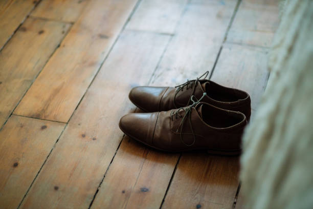 istock What's a man without his shoes? 1174338651