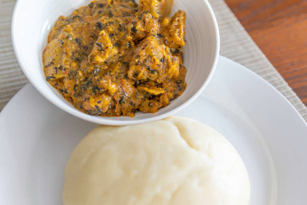 istock Nigerian Pounded Yam served with Spicy Bitter leaf soup 1174341212