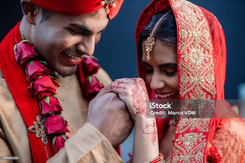 The day they'd remember forever Shot of a happy young couple on their wedding day Wedding Stock Photo