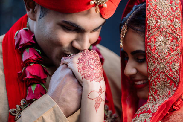 I found my queen in you Shot of a happy young couple on their wedding day human hand traditional culture india ethnic stock pictures, royalty-free photos & images