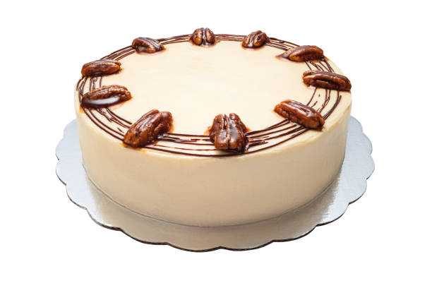 istock Cake piece with chocolate, milk cream, carrots and nuts isolated on white background 1174351258