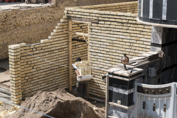 Baghdad, Iraq - June 29, 2019: Worker in Baghdad build house