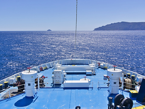 Large ferryboat ship  bow with equipment while sailing in Aegean sea, Greece.