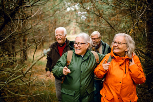 Seniors hiking through the foerst