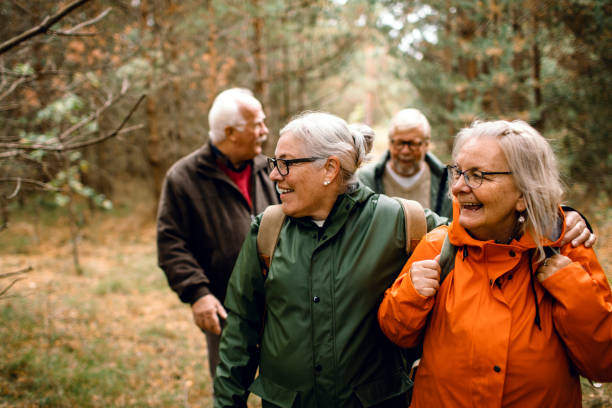 istock Seniors hiking through the foerst 1174358504