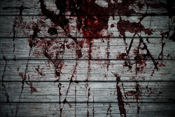 istock grunge halloween background with blood splash space on wall 1174368880