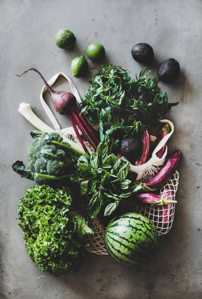 istock Healthy grocery goods in net bag over concrete kitchen counter 1174369019