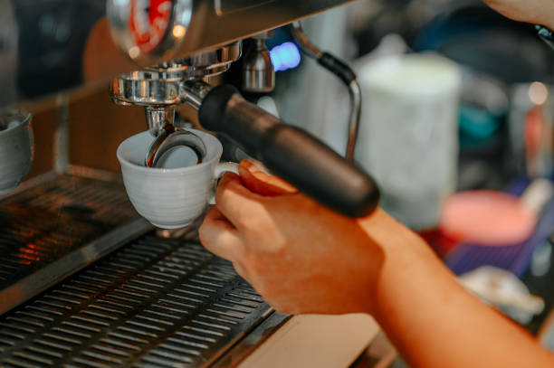 istock Coffee makers are making coffee with coffee machines.Barista  are making coffee. 1174369435