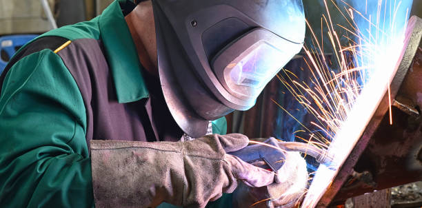 istock welder at work in an industrial company 1174369737