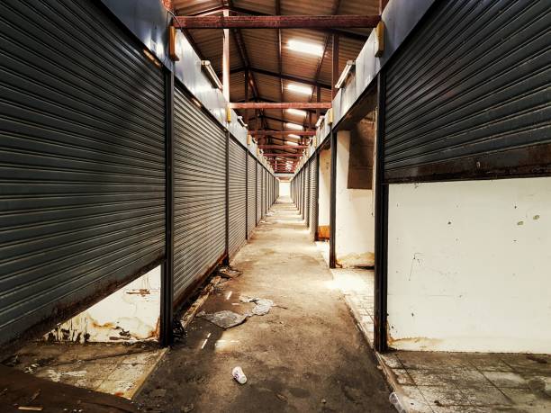 istock old creepy abandoned​ industrial​ warehouse​ 1174370680