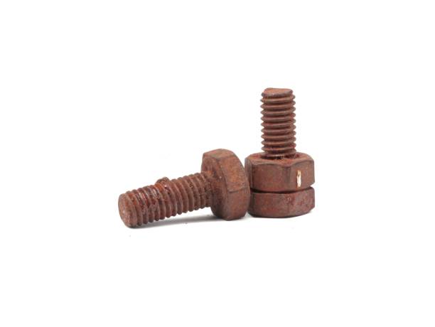istock old rusty bolts and nuts on​ white​ background​ 1174370707