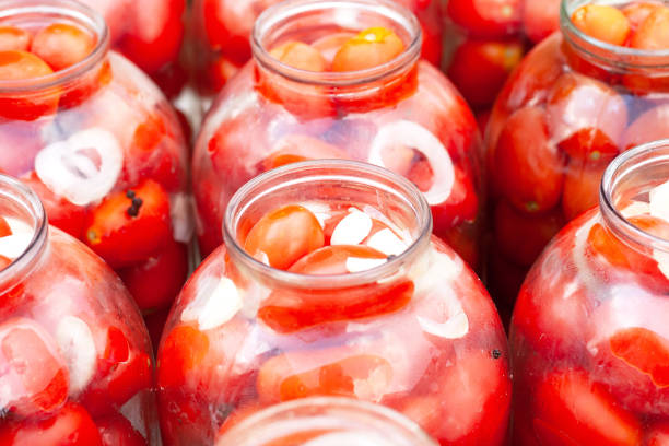 istock pickled (canned) tomatoes in jars.fermentation of tomatoes 1174370844