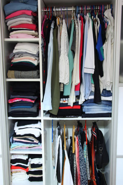 istock Modern wooden wardrobe with clothes 1174371861