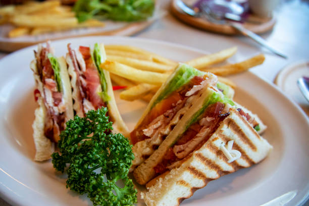 istock Tomato and lettuce, meat sandwich and potato 1174373698