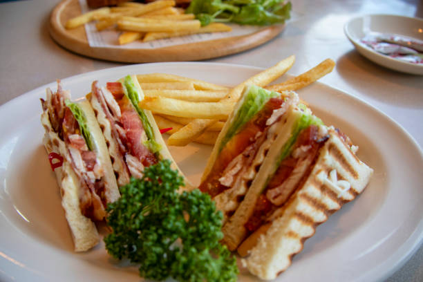 istock Tomato and lettuce, meat sandwich and potato 1174373871