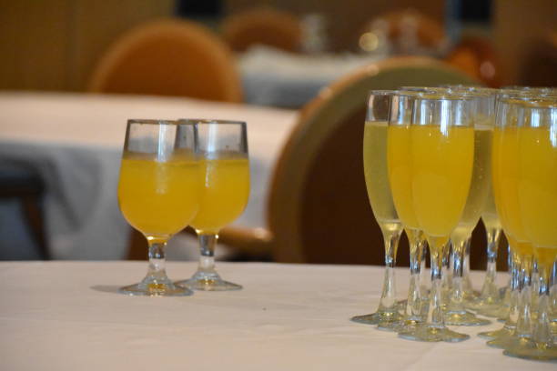 istock Cups of orange juice 1174374061
