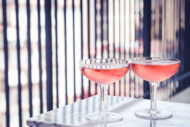 istock Two crystal stemmed glasses with rose wine 1174374134