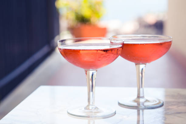 Two crystal stemmed glasses with rose wine