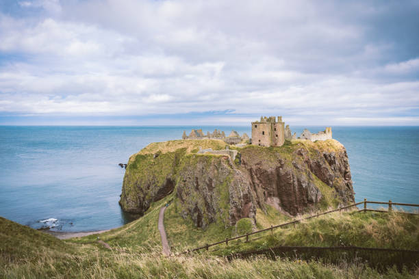 istock Cloudy day on Dunnottar Castle - Scotland 1174375269