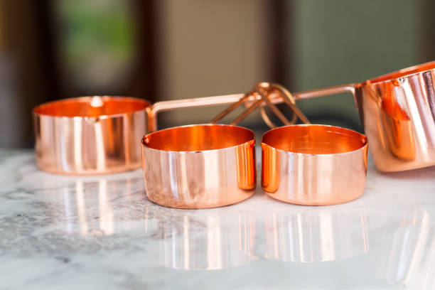 istock Copper cups on marble. Ready to cook 1174375565