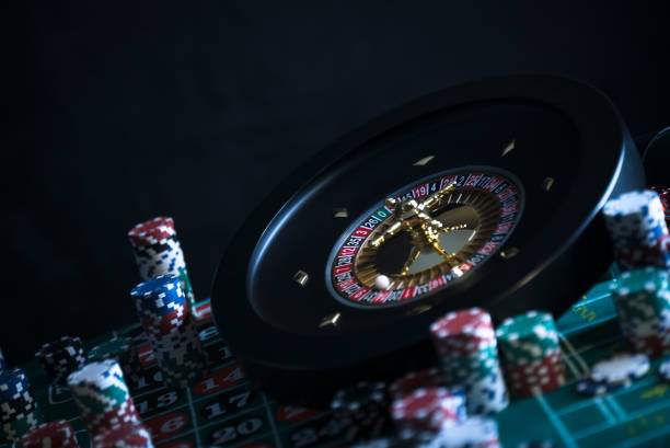 istock Poker Chips with roulette, gambling games concept. 1174376182