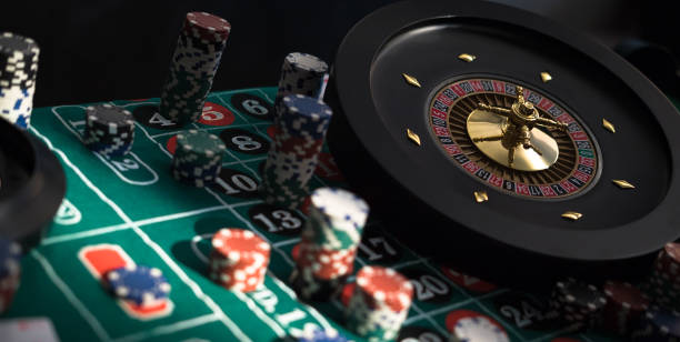 istock Poker Chips with roulette, gambling games concept. 1174376282