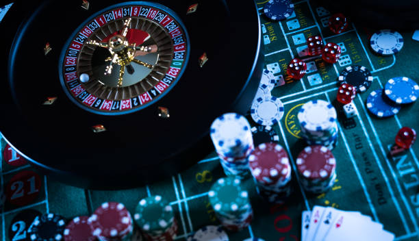 istock Poker Chips with roulette, gambling games concept. 1174376568