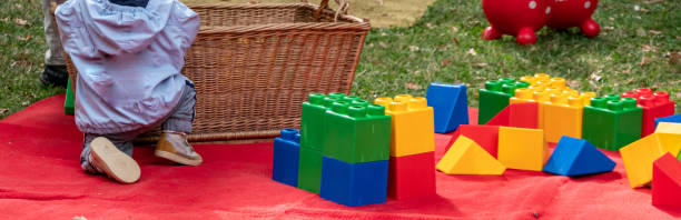 Panorama toddler playing at the playground