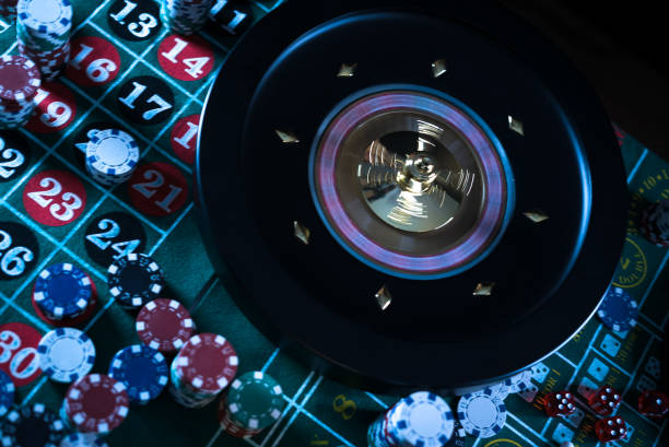 istock Poker Chips with roulette, gambling games concept. 1174376603