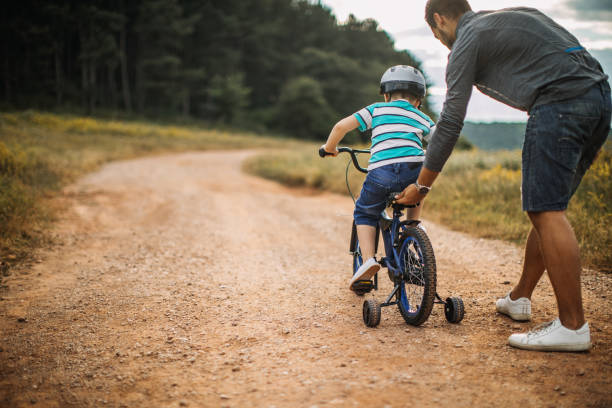 istock Father and son spending time in nature 1174382155