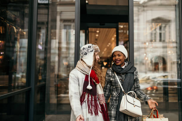 istock Two young women shopping for Christmas 1174384046