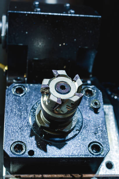 istock Modern CNC machine tool, face milling cutter close-up. 1174385569
