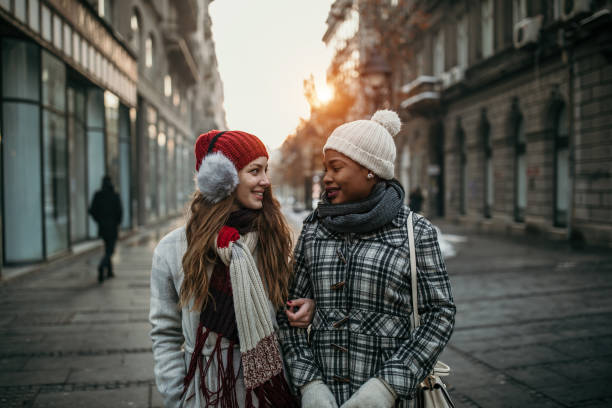istock Two young women shopping for Christmas 1174386636