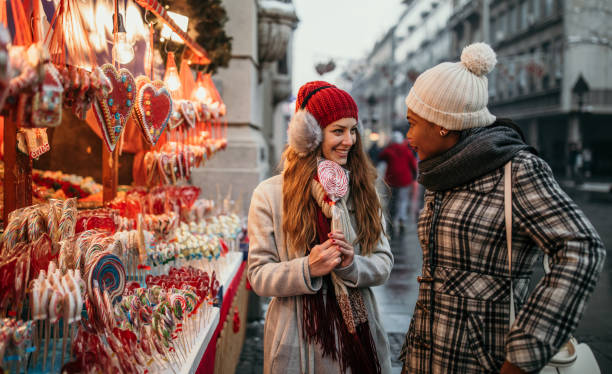 istock Two young women shopping for Christmas 1174386757