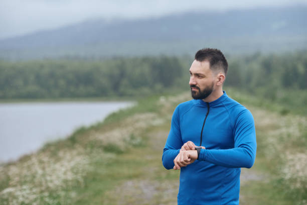 istock Man with smart watch during outdoor work out 1174388797