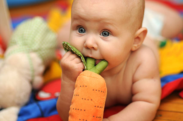 Baby with beautiful blue eyes. stock photo