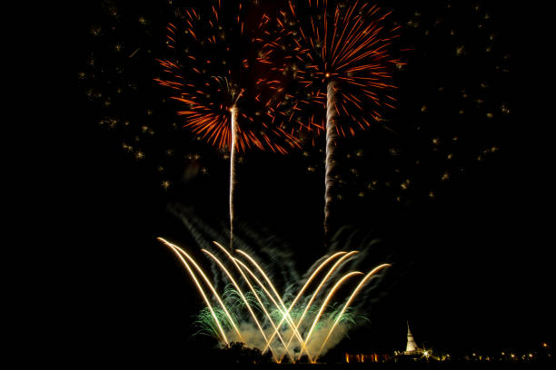 istock Huge, colorful fireworks over the rice fields at dusk. 1174400835
