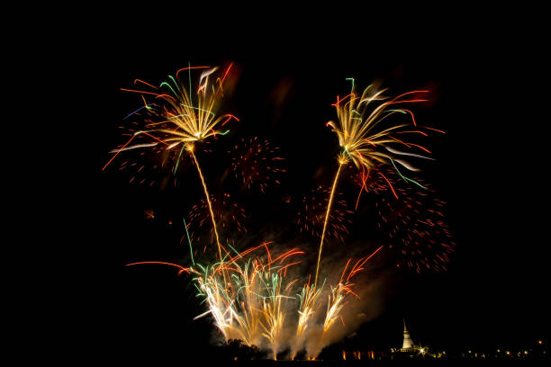 istock Huge, colorful fireworks over the rice fields at dusk. 1174400844