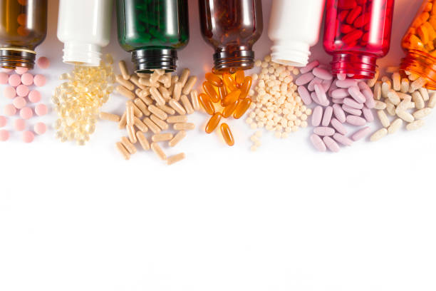 錠剤の背景 - nutritional supplement fish oil vitamin pill bottle ストックフォトと画像