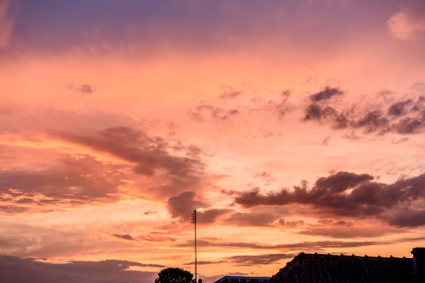 Clouds on sky in pink colours, sunset or sunrise