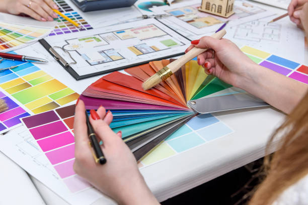 istock Team of creative designers discussing colour swatch 1174411999