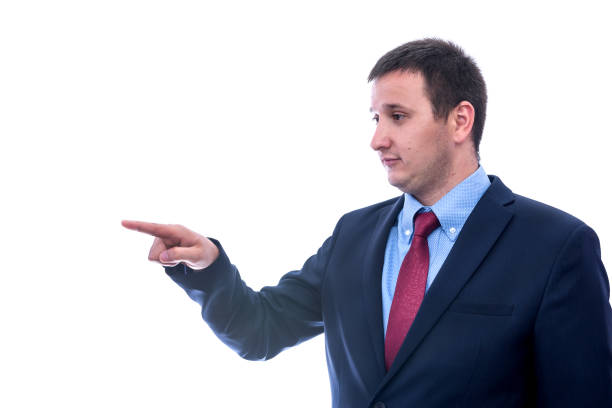 istock Young man in suit gesturing isolated on white 1174412216