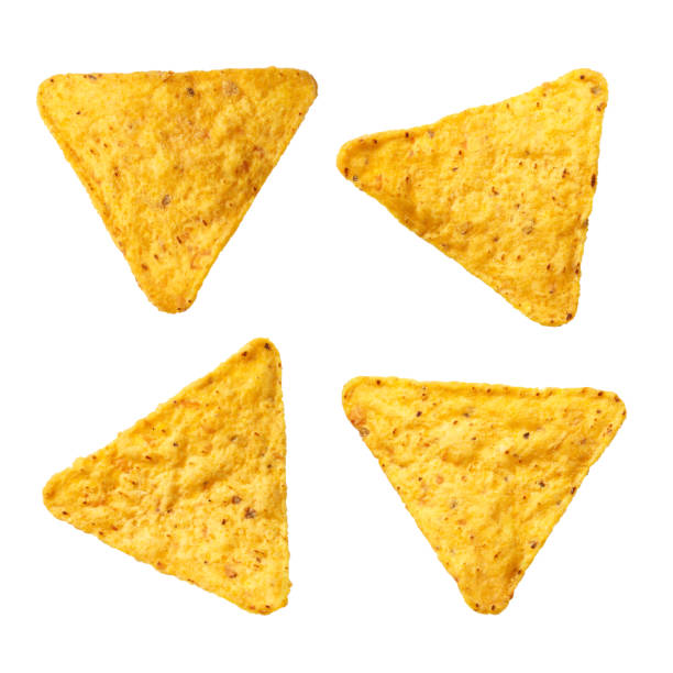 Set of mexican nachos chips on white Set of mexican nachos chips, isolated on white background tortilla chip photos stock pictures, royalty-free photos & images