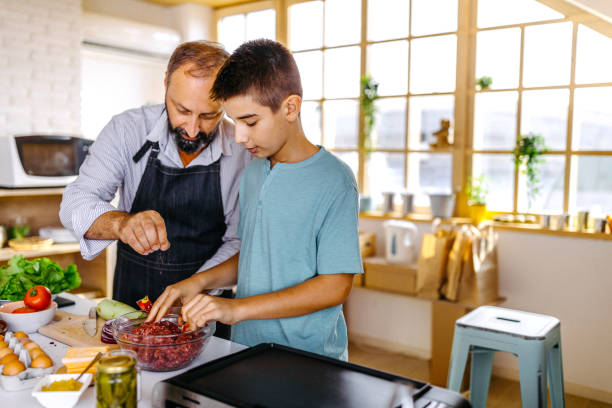 istock Who said cooking was for girls? 1174417242