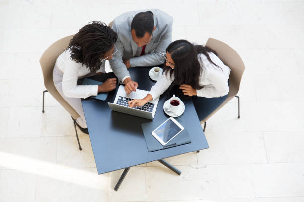 istock Business team watching and discussing project presentation 1174418042