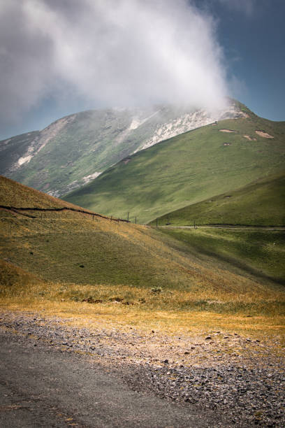 istock beautiful scenic view on iraty hills covered by clouds, Basque country 1174418603