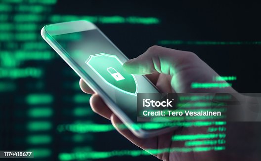 istock Mobile phone personal data and cyber security threat concept. Cellphone fraud. Smartphone hacked with illegal spyware, ransomware or trojan software. Hacker doing online scam. 1174418677