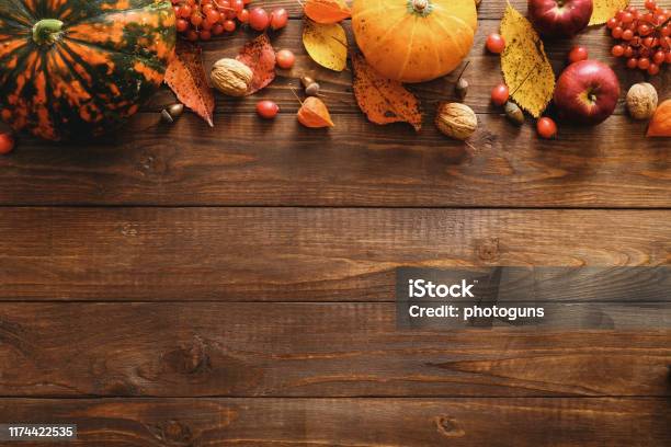 Happy Thanksgiving Concept Autumn Composition With Ripe Orange Pumpkins Fallen Leaves Dry Flowers On Rustic Wooden Table Flat Lay Top View Copy Space Stock Photo - Download Image Now